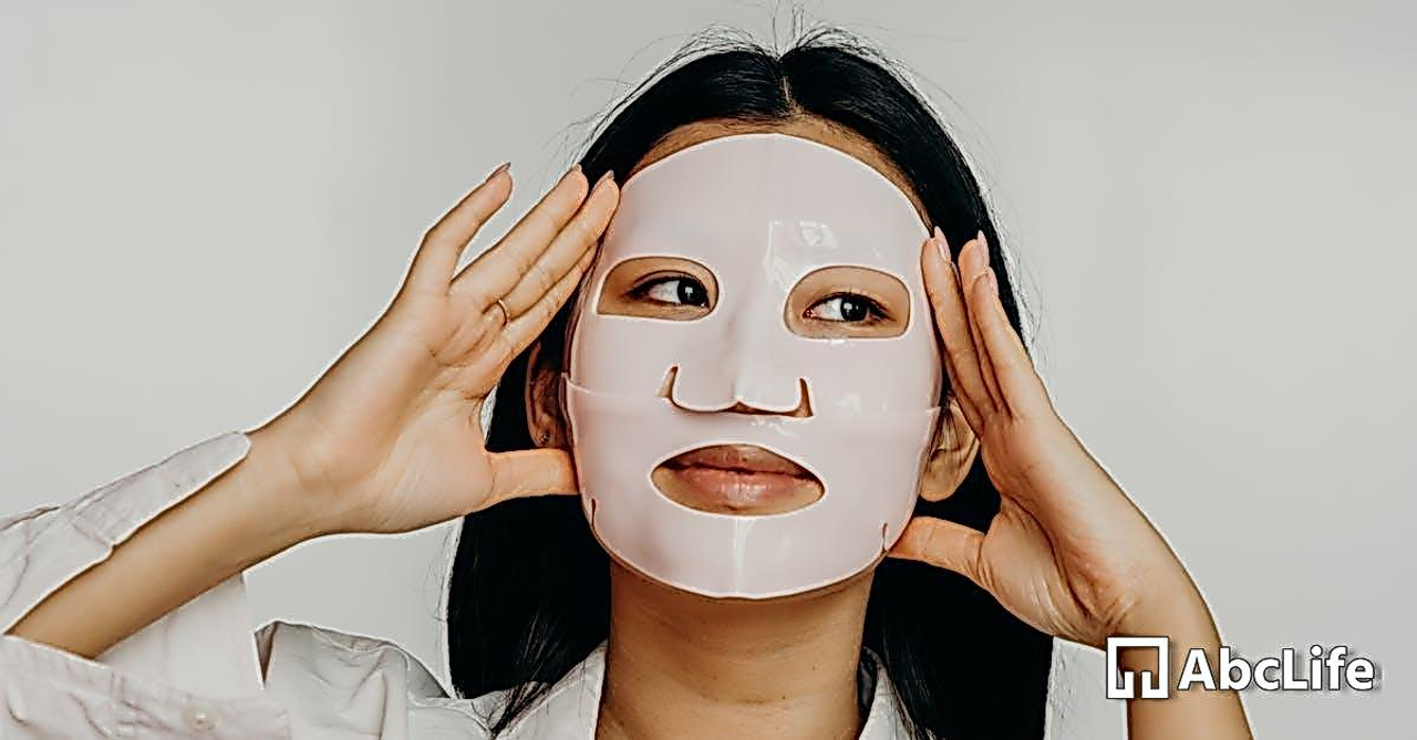 A Woman in White Long Sleeves with Facial Mask on Her Face